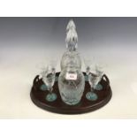 Two spirit decanters together with six glasses and a gallery tray