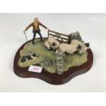 A boxed Border Fine Arts limited edition figurine One man with his Dog, 4/850