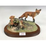 A boxed Border Fine Arts limited edition figurine of a fox and family, 1337/1500