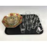 An enamelled strawberry set together with a lustre bowl and glasses