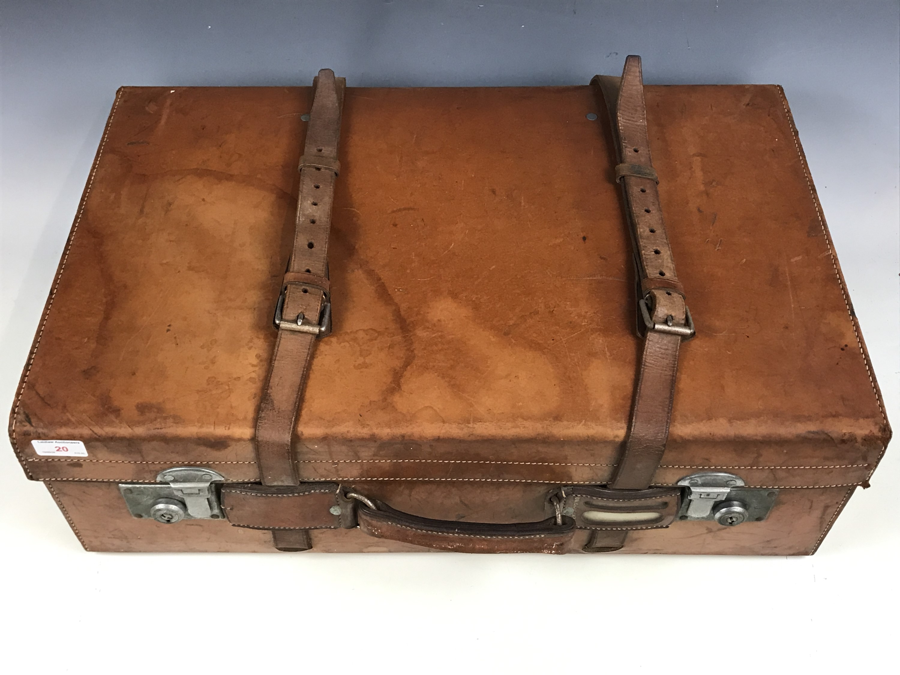 A vintage hide suitcase