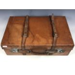 A vintage hide suitcase