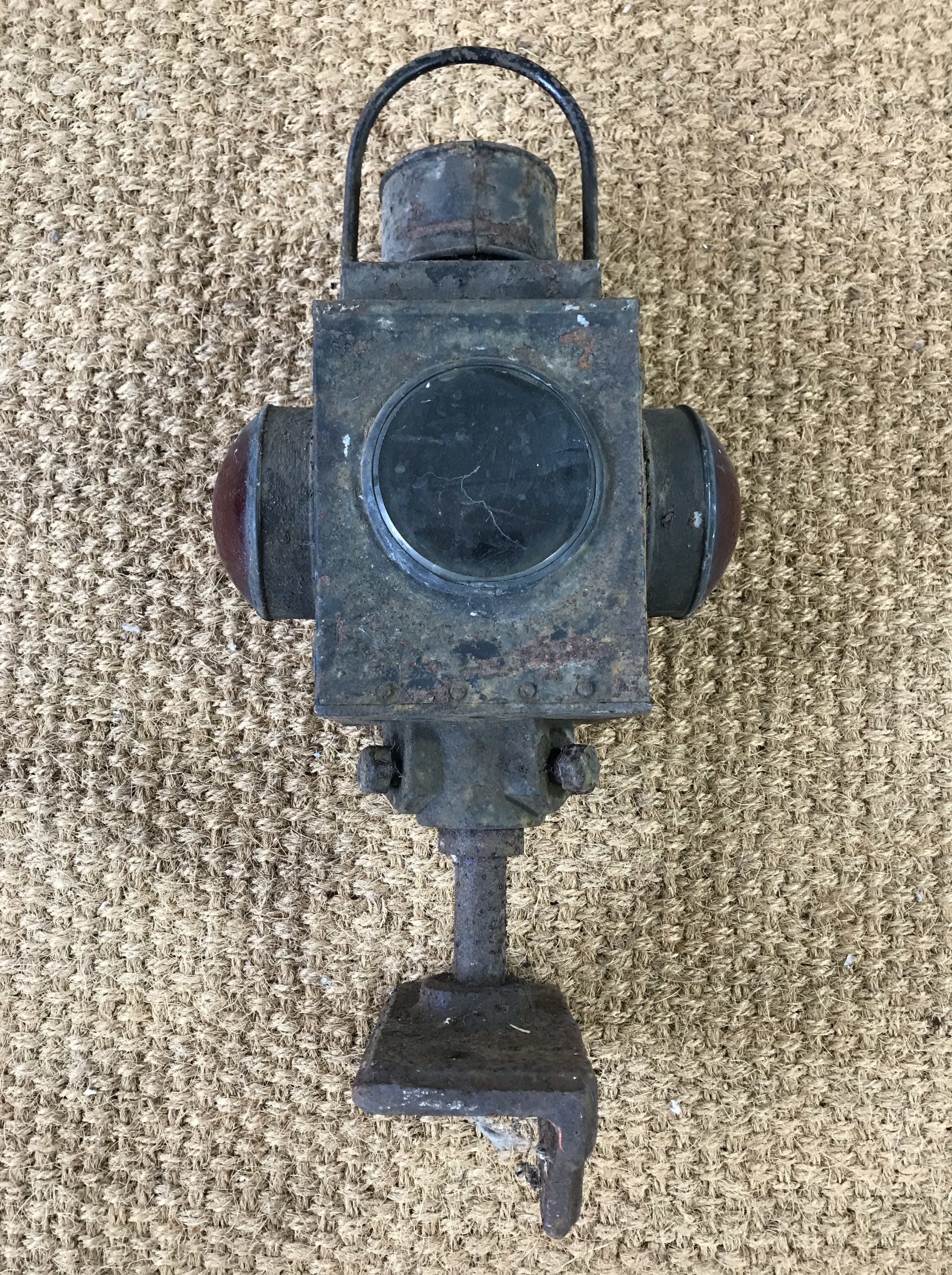A late 19th / early 20th Century railway level crossing oil / paraffin lamp and mount