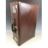 A vintage Globe Trotter faux-hide travel case bearing 1950s Canadian Pacific SS Empress of