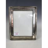 A large silver photograph frame engraved 'Dec 6th 1888-1913'