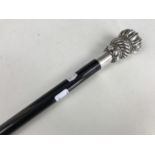 A contemporary ebonised walking cane with electroplate pommel