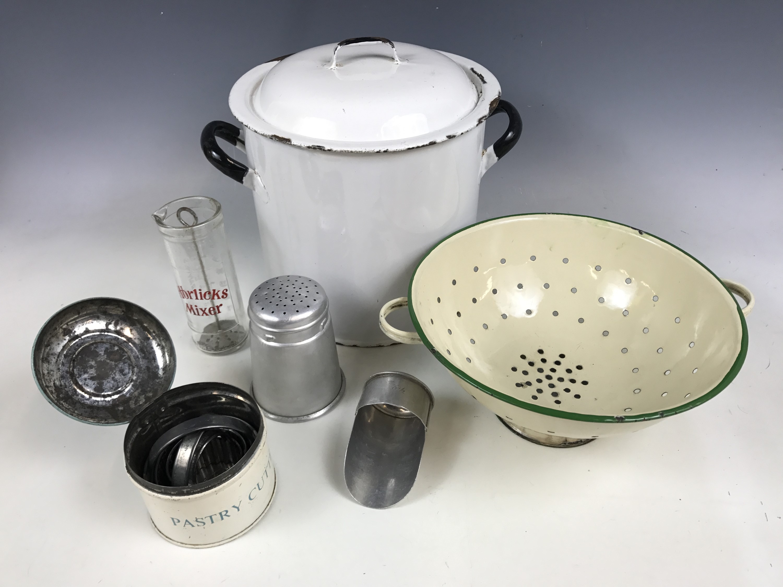 Vintage kitchenalia, including an enamelled bread bin, an enamelled colander, Tala Ware pastry