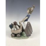 A Lladro figurine entitled Litter of Fun 5364