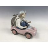 A Lladro figurine entitled Out for a Spin 5770