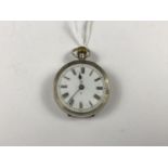 A Victorian silver cased fob watch, having a white enamelled face with Roman numerals, and an