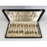 A cased set of twelve Norwegian silver-gilt coffee spoons, in a moderne design with black