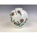 A Chinese doucai porcelain oviform vase, character marks to base, 12 cm