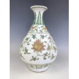 A Chinese porcelain lotus pattern yuhuchunping vase, moulded seal mark to base, 32 cm