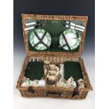 A traditional Optima wicker picnic hamper with crockery etc.