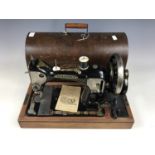 A cased Hexagon 'Lock Stitch' sewing machine, circa 1919