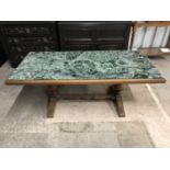 A large faux-marble-topped coffee table