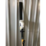 A Ryobi RPT400 telescopic electric hedge trimmer