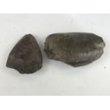 Two Neolithic / Bronze Age polished stone hand axes, one bearing old collection inventory number