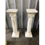 A pair of white painted pre-cast Corinthian columns, 83 cm high