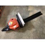 A Flymo XLH550 petrol hedge trimmer