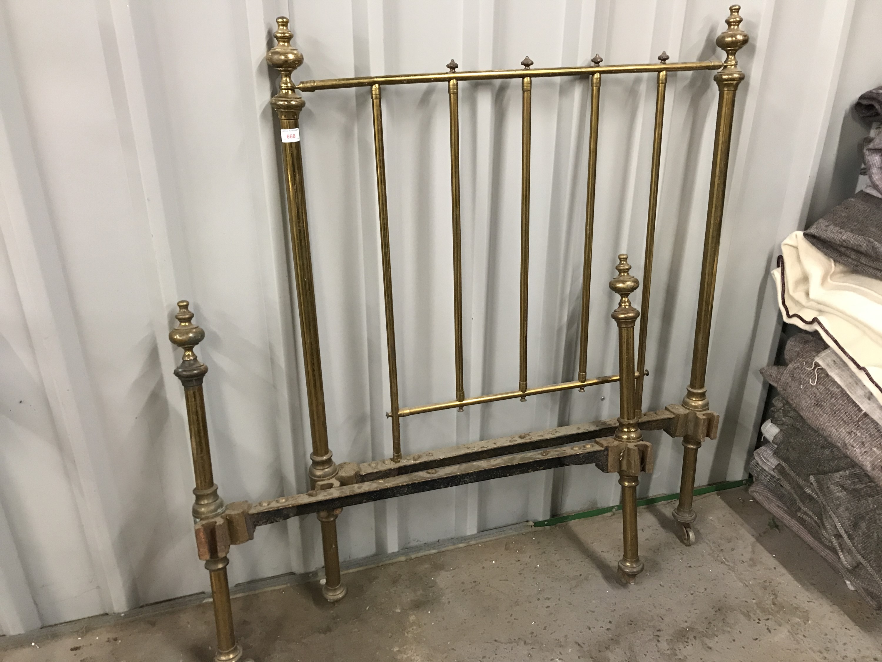 A Victorian brass single bed head and foot