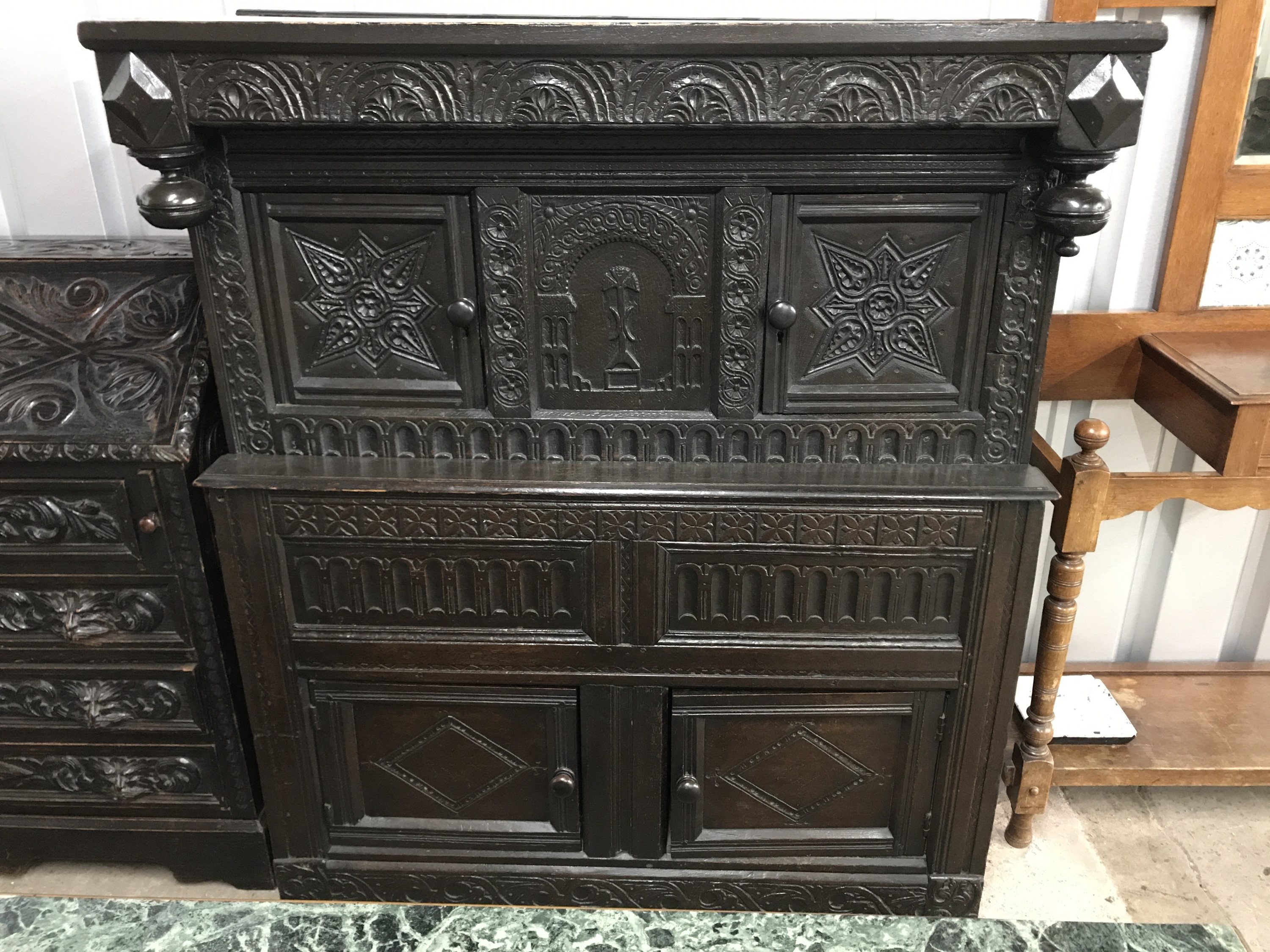 A joined oak court cupboard of diminutive statue, 17th century and later