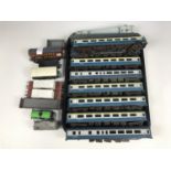 [Model Railway] A quantity of model railway rolling stock including carriages etc.