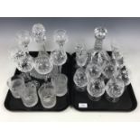 A suite of cut glass including hock, sherry and brandy glasses together with two decanters and