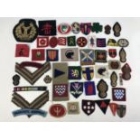 A quantity of British Army cloth badges etc.