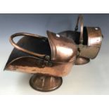 Two copper coal helmets (one a/f)