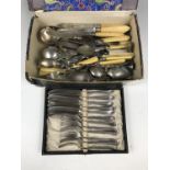 A quantity of 19th century cutlery including cased fish eaters and a Martini cocktail spoon etc.
