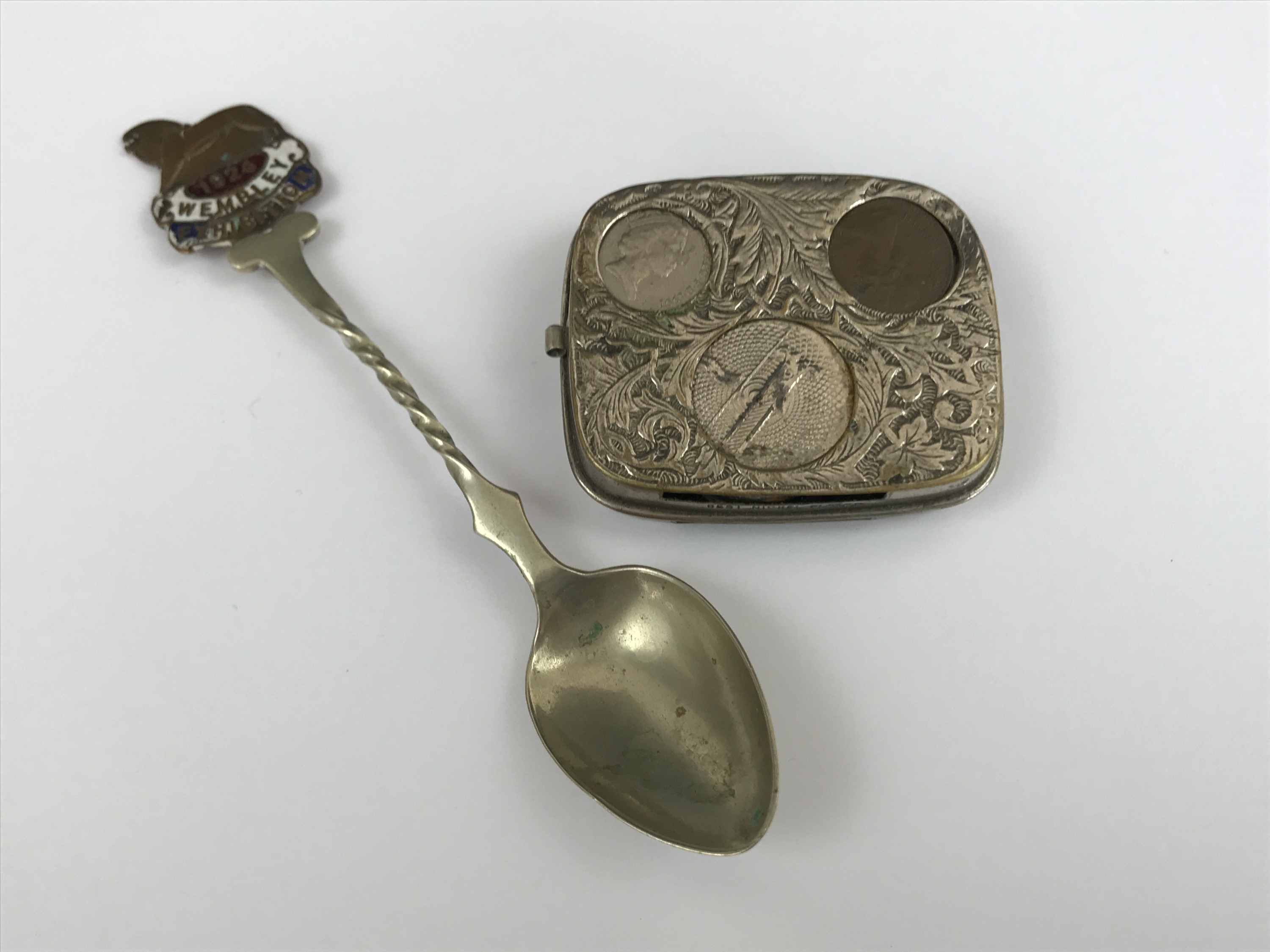 A 1924 Wembley Exhibition commemorative spoon, together with an electroplate coin case