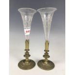 A pair of late Victorian electroplate and glass epergnes