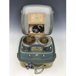 A Grundig TK25 reel-to-reel projector circa 1950s - 1960s, together with a GCM3 microphone and