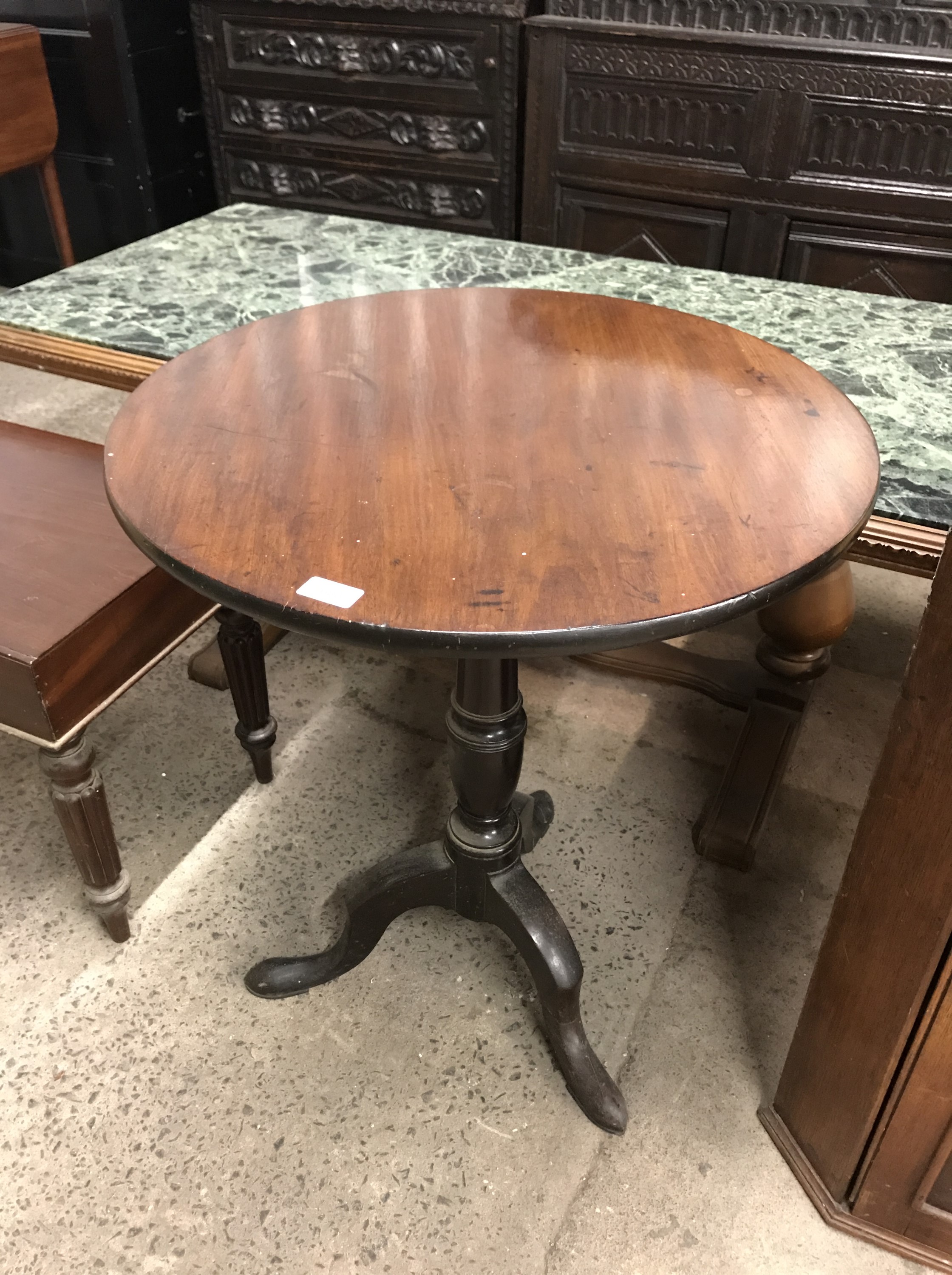 A late Georgian mahogany tripod tea table