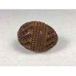 A 19th Century carved coquilla nut pocket pomander