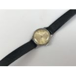 A 1960s lady's Omega stainless steel wrist watch, having a silvered face and baton markers