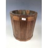 A copper-banded coopered peat bucket