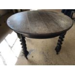 A late 19th / early 20th Century oak centre or breakfast table, 122 cm diameter