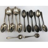 A set of six Elizabeth II silver coffee spoons, together with five George VI silver teaspoons, and a