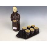 A Beswick ceramic monk decanter together with six shot glasses for Heatmaster (tray a/f)