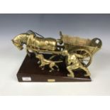 A brass model of a horse and cart entitled "The Toil"