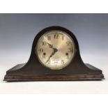 A mahogany cased 'Napoleon hat' mantle clock