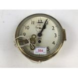 A Smiths Empire brass bulkhead clock with key