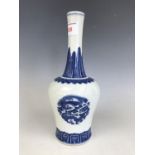 A Chinese blue and white porcelain yaolingzun vase, decorated with dragon-and-phoenix vignettes,