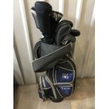 A Lynx Black Cat golf bag and clubs including Knight No. 3 and No. 7 woods, The Big Easy 10.5