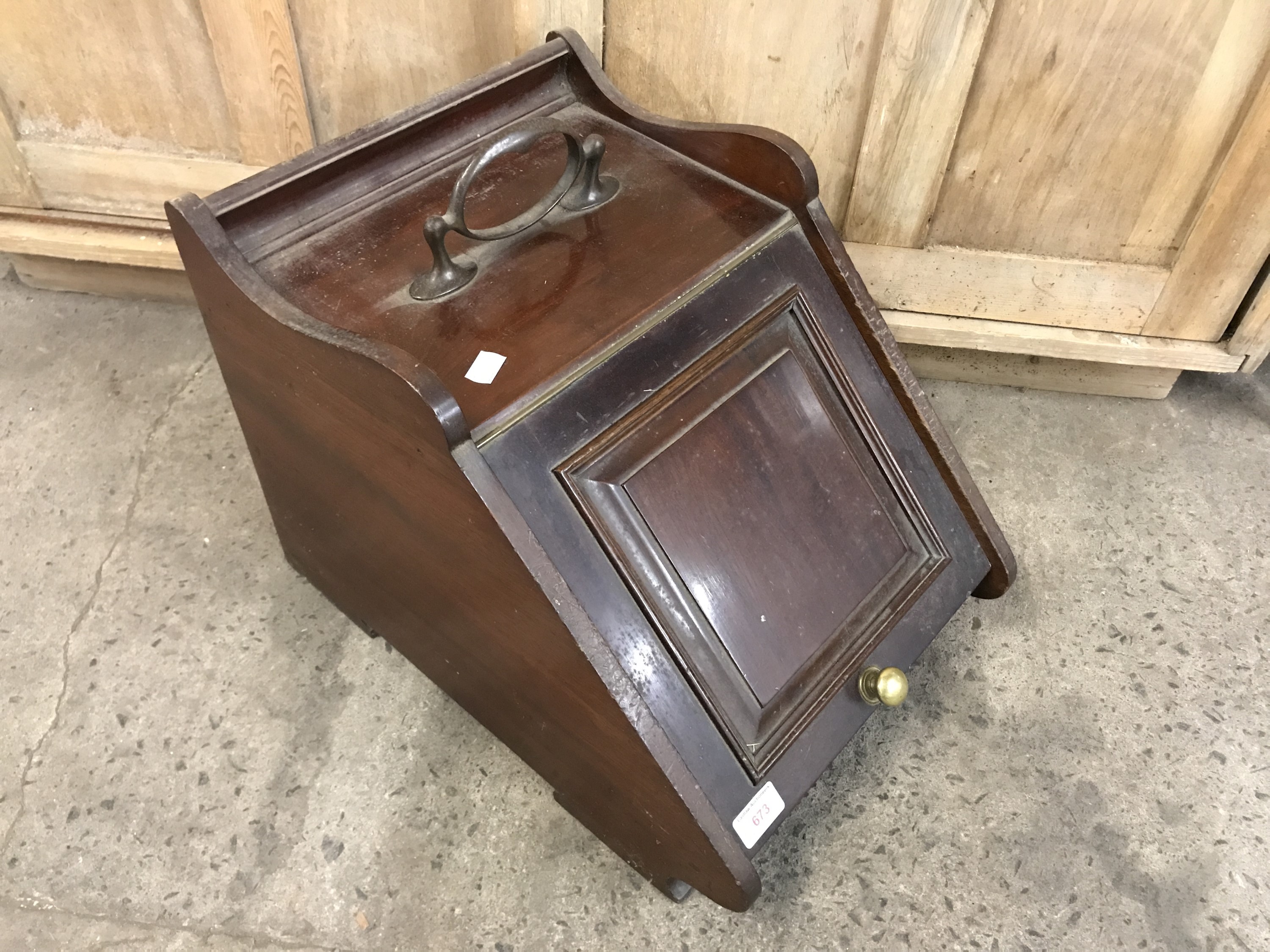 A Victorian mahogany coal box