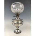 A Victorian electroplate oil lamp with etched glass shade, 37 cm