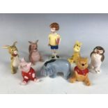 Eight Beswick "Winnie the Pooh" figurines, including 'Winnie the Pooh', No. 2193; 'Eeyore', No.