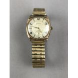 A gentleman's 9ct gold cased wristwatch, having a silvered face, subsidiary seconds, Arabric